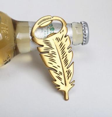 China Cool Innovative wedding favor, fancy gift, die casting zinc alloy gold plating feather shape beer bottle opener for sale