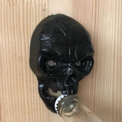 China Cool Innovative Cast Iron Skull Head Wall-mounted Bar Beer Bottle Opener, White Blue and Black Color, Engrave Logo for sale