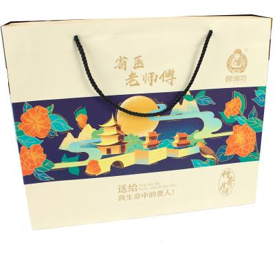 China Recyclable printed paper bags with your own logo for main clothing gift food paper bag making machine for sale