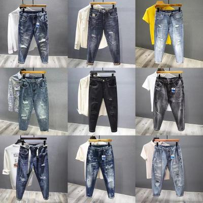 China Breathable 2023 spring new vintage ripped jeans men's fashion brand thin feet small nine-point pants Korean version of the trend long pants for sale