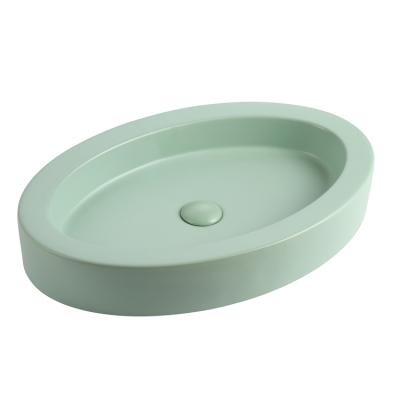 China Modern Promotional Modern Wash Basin Lavatory Green Matte Face Ceramic Basin for sale