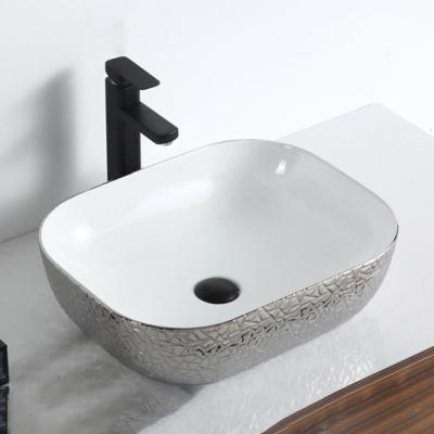 China Wholesale Durable No Connection Hole Above Basin Bathroom Electroplating Ceramic Sink for sale