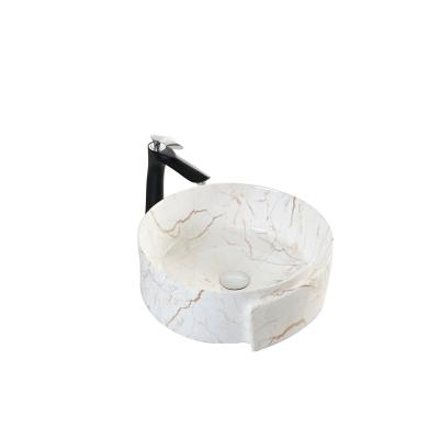 China Durable Nordic Style Above Household Stone Bathroom Basin Grain Art Ceramic Sink for sale