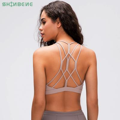 China Sweat-Wicking SHINBENE FLY Criss Cross Fitness Sport Training Bras Top Women Butter Soft Skinfriendly Workout Gym Yoga Bra Exercise Top for sale