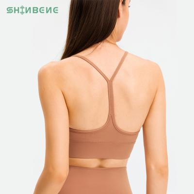 China Sweat-Wicking SHINBENE Women's High Quality Naked Women's Workout Sports Bra Impact Solid Color Impact Workouts Yoga Sports Bra Tops Mid for sale