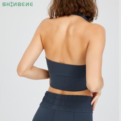 China Sweat-Wicking SHINBENE Front Zipper Halter Fitness Sports Bra Tops Workout Backless Shockproof Vest Women Yoga Sports Bra for sale