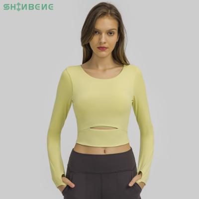 China Sweat-Wicking SHINBENE CUTOUT Padded Yoga Long Sleeve Crop Pullover Womens O Neck Top Plus Size Fitness Workout Sports Tank Top With Built In Bra for sale