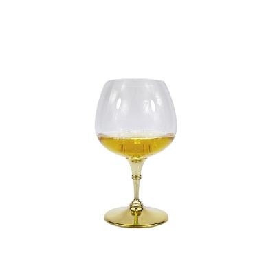 China Viable Gold Floral Wine Glass Colored Brandy Cups Wholesale Stemless Brandy Cup for sale