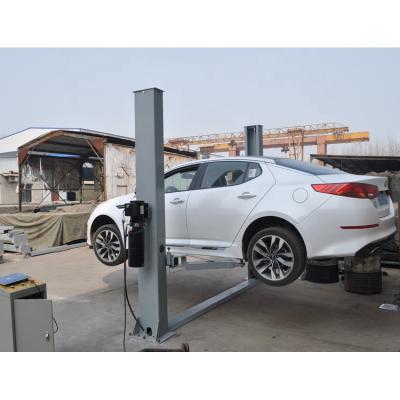 China Auto repair two post car lift with floor plate style design for low ceiling workshop. for sale