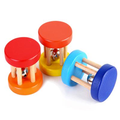 China Eco-Friendly Wooden Montessori Rattle Bell Rolling Mini Hand Bell Toy For Baby Game for sale