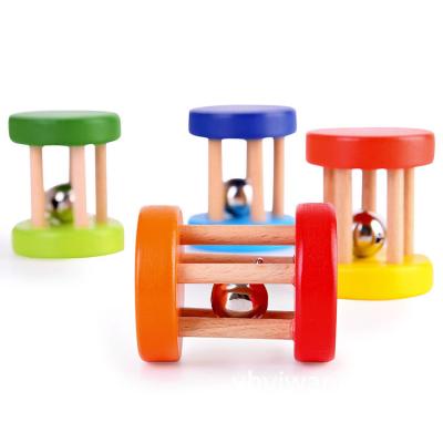 China Eco-friendly Material Wooden Musical Instruments Sounds Hand Bells Wooden Baby Rattles Toys for sale