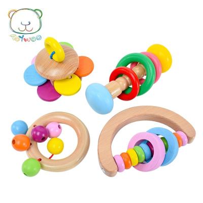 China Early Education Toys Rattle Four-piece Handbell Set Orff Infant Handheld Rattle Wooden Eco-friendly Material Musical Instrument For Babies for sale