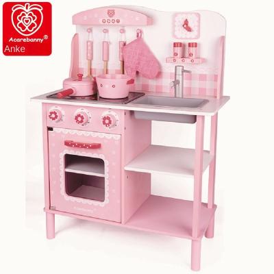 China Wooden Pink Children's House Girl's Play Kitchen Wooden Toy Kitchen Set For Children for sale