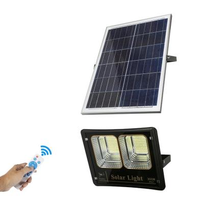 China High Brightness PEIHU Outdoor 50w 80w 150w 200w 300w Led Solar Flood Light With Remote Control Solar Panels for sale