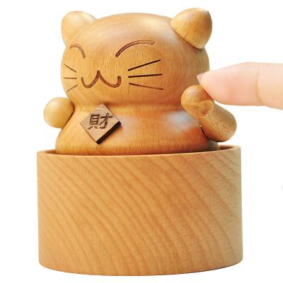 China Year Mini Carousel Lucky Cat Music Box Solid Wood Cake Music Box Decoration Birthday Gift for sale