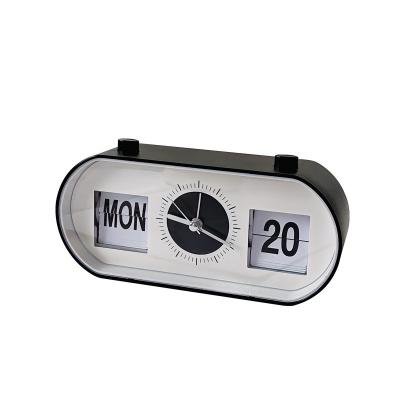 China Hotel and Resort Manual Button Desktop Alarm Clock with Creative Page Flipping Calendar for sale