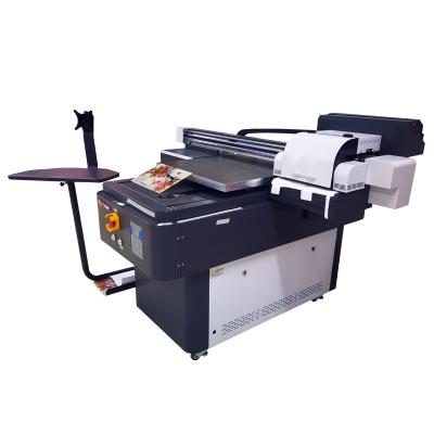 China Multi Function 6090 UV LED Flatbed Printing Machine Equipment New Design for sale