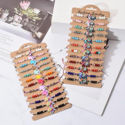 China Hot Selling Handwoven Color Map String Oil Alloy Kingcome Amazon Animal Bracelet Sets FASHIONABLE Crystal Beads Bracelets for sale