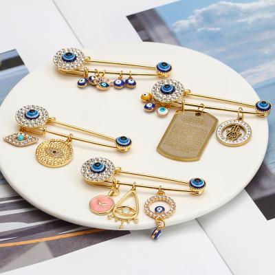 China Europe and America Simple New Ornament Crystal Buckle Clip Collar Brooch Blue Devil Eyes Accessories Angel Eye Pin Brooch Bad for sale