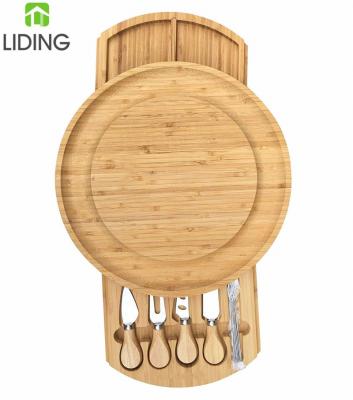 China Sustainable Bamboo Cheese Board With Cutlery Set Wooden Serving Tray Tray With Removable Slide-out Drawers for sale