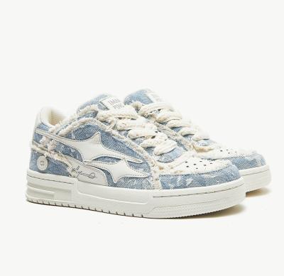 China Sneakers de piel de mujer hechos a medida zapatillas de pie redondo de lona de denim en venta