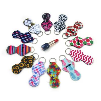 China Trendy Jewelry Style Multi Colored Neoprene Lip Balm Holder Lip Pomade Stick Holder Keychains for sale