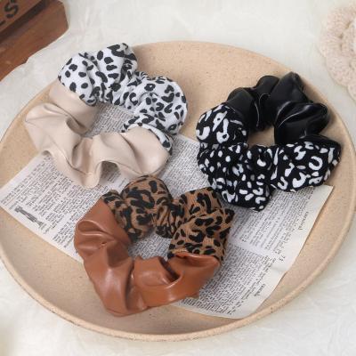 China New Soft Vintage Leopard Printing PU Hair Tie Rope Leather Stitching Head Accessory for sale