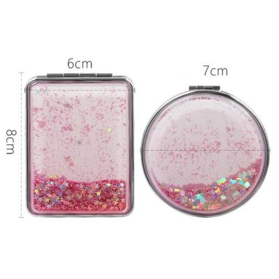 China Personalized Cute Portable Pocket Creative Mirror Quicksand Gift Hand Makeup Mirror for sale