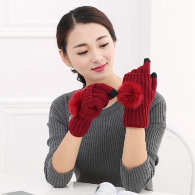 China Fashion Knitted Warm Jacquard Gloves Woolen Ball Touch Screen Women Gloves In Winter for sale