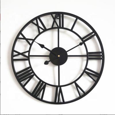 China New Style Multifunctional Modern Low Price High Quality Metal Oval Shape Black Decorative Wall Clock for sale