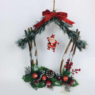 China New Type Natural Santa Claus Artificial Wall Flower Needle Pine Christmas Cottage PVC Rattan House Pendant Cottage for sale