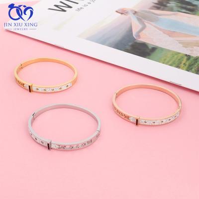 China Luxury Fashion Casual/Sporty 18K Gold PVD Plated Oval Zircon Cuff Bracelet Stainless Steel Pave Open Zircon Cuff Bracelet For Women for sale