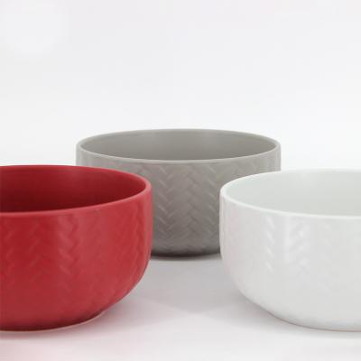 China Sustainable ceramic rice bowl with color glaze embossing process is popular among people for sale