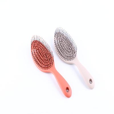 China 2020 new fashion fashion hair comb plastic hollow multifunctional comb supplies fluffy elastic hair comb makeup comb customization for sale