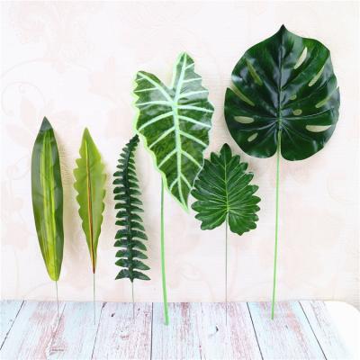 China Home Decorative Minimalist Wedding Monstera Leaves Artificial Palm Leaves for sale