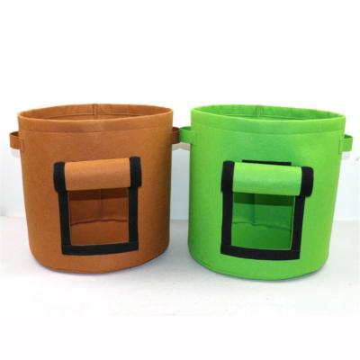 China Nursery Grow Bag Plant Bag Vegetable Garden Wholesale Plant Growing Pot Felt Grow Bag With Handles for sale