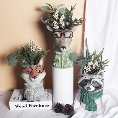 China Europe Customized Newest Design Deer Statue High Quality Promotional Resin Animal Vase Winter Home Decor for sale