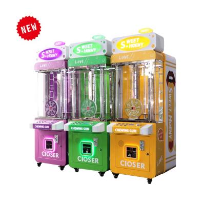 China Metal Cabinet and Newcomer Cash Chewing Gum and Temered Glass Coin Operated Arcade Prize Vending Game Machine for Sale for sale