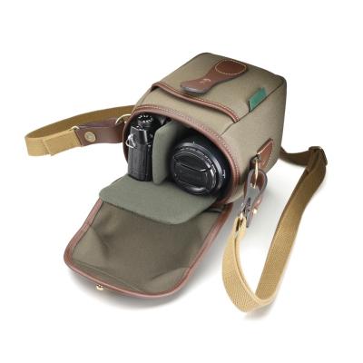 China Canvas Portable Durable Dslr Waterproof Travel Camera Waist Bag For Women Men for sale