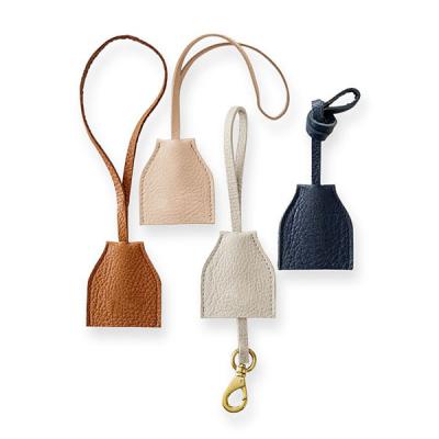 China Customized Sustainable Hang Tags Exquisite Gift Mini Leather Bag Pendant Hangtags For Apparel With Own Logo for sale