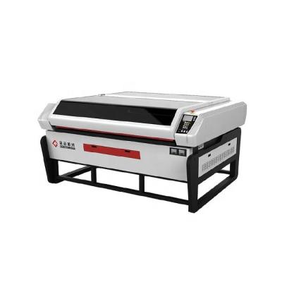 China Water Cooled Laser Cutting Engraving Machine With Electric Lift Table For Textile Leather Cloth 1300*900mm Cutting Area CO2 for sale