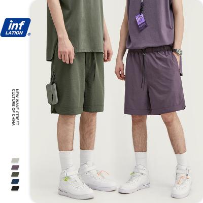 China Anti-Wrinkle Low Price Quick Dry Men's Casual Solid Color Plus Size Cargo Sporty Shorts With Drawstring for sale