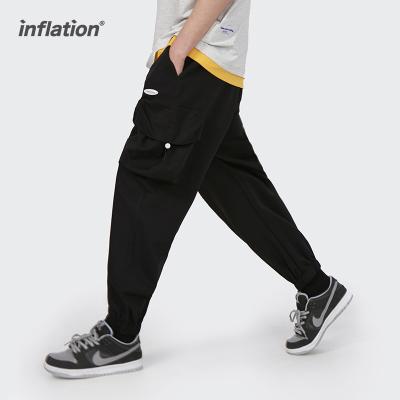 China OEM Fashion QUICK DRY Cargo Pants Men Streetwear Japanese Casual Drawstring Sportswear Harem Pants for sale