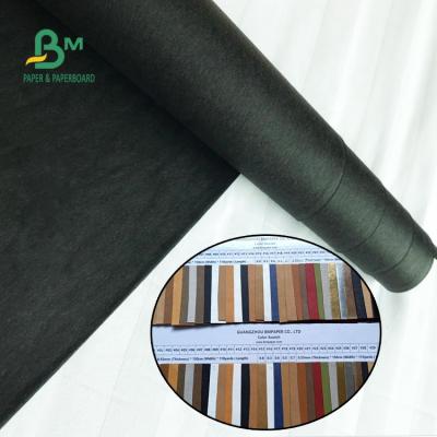 China Waterproof Washable Width 150cm 0.55mm Black Paper Sewable Beside Leather for sale