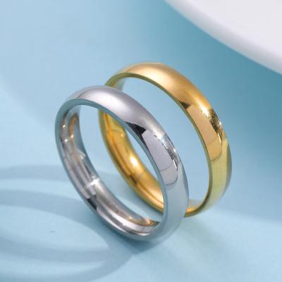 China 2022 FASHIONABLE Ring Classic Gold Plated Stainless Steel Simple Trendy Solid Color Couples Rings For Wedding for sale