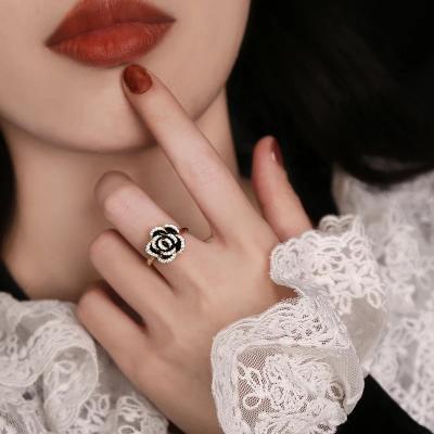 China Trendy Trendy New Fashion Simple Flower Adjustable Rings Full Diamond Black Flower Open Rings for Girls for sale