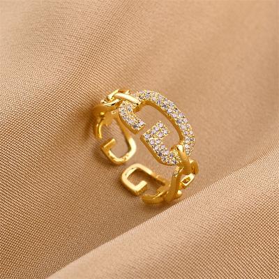 China TRENDY Gold Plated Women Hollow Rings Simple Adjustable Zircon Initial G Inlaid Rings for sale