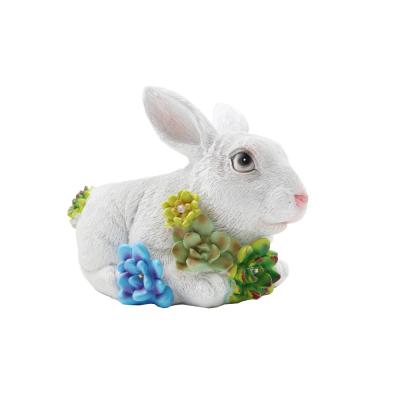 China Europe Resin Crafts Outdoor Waterproof Solar Lights Rabbit Flower Pot For Garden Decor for sale