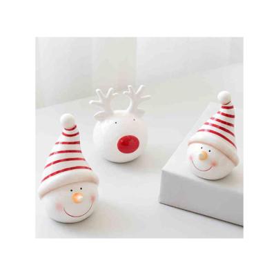 China Nordic Europe Miniatures House Resin Christmas Gifts Snow Man For Office Decoration for sale