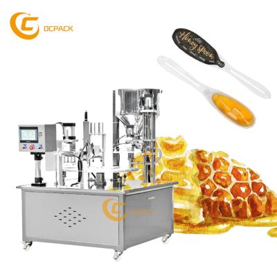 China High Accuracy Automatic Food Sealing Machine Tray Honey Spoon Filling Plastic Packing Machine for sale